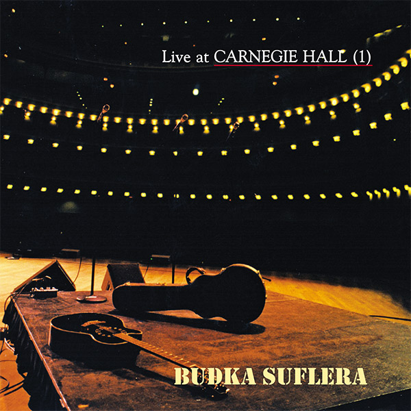 Okładka albumu Budka Suflera "Live at Carnegie Hall (1)" Zawiera zdjęcie wnętrza hali koncertowej z perspektywy sceny.